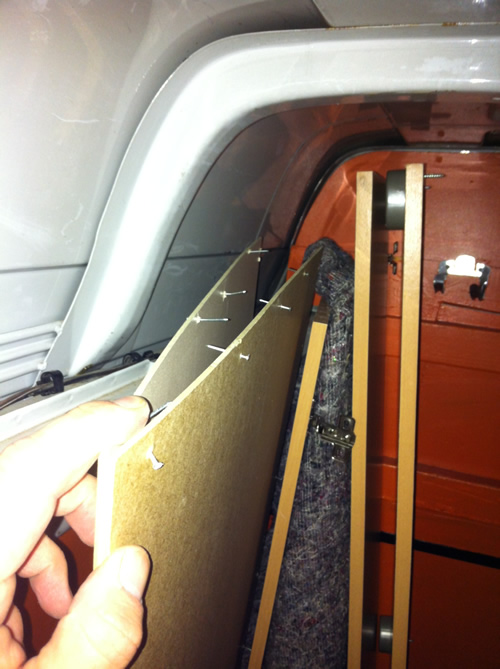 Please don't leave nails in the back panels! Nails in Panel Image